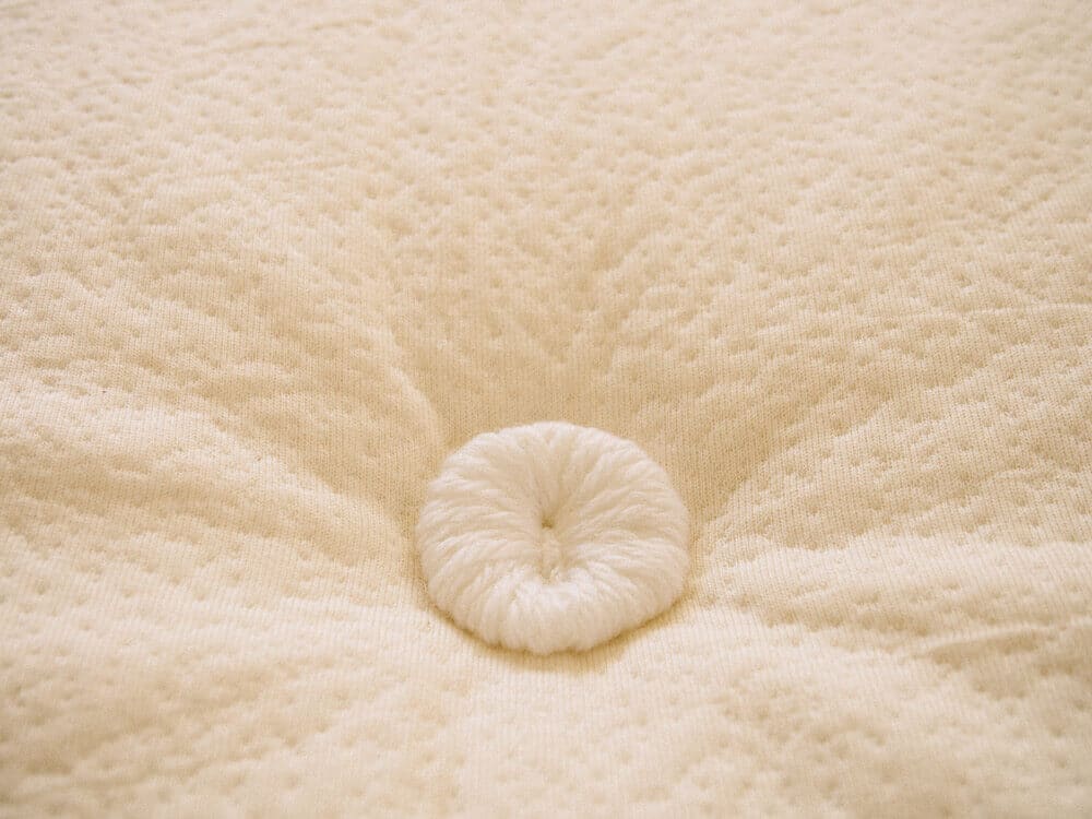 Hand-tufted rosettes on pillowtop mattress