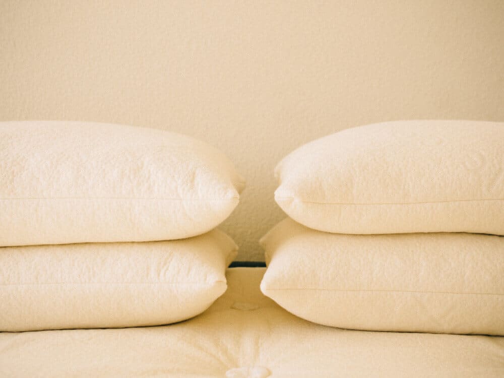 Avocado green pillows stuffed with natural kapok fiber and Dunlop latex rubber foam