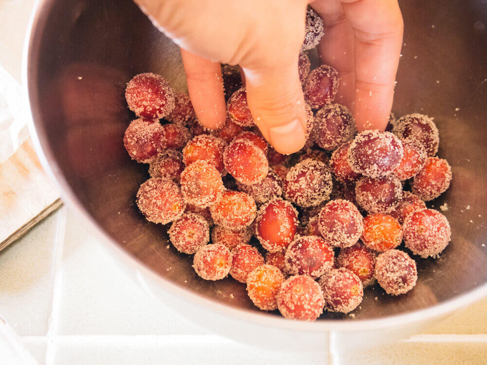Roll cranberries in sugar