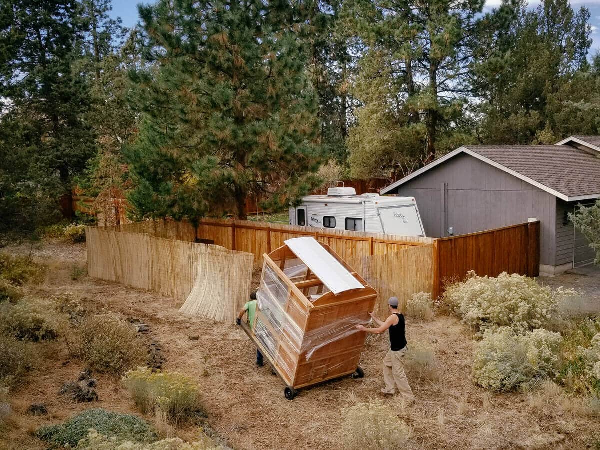Wheeling the chicken coop into place