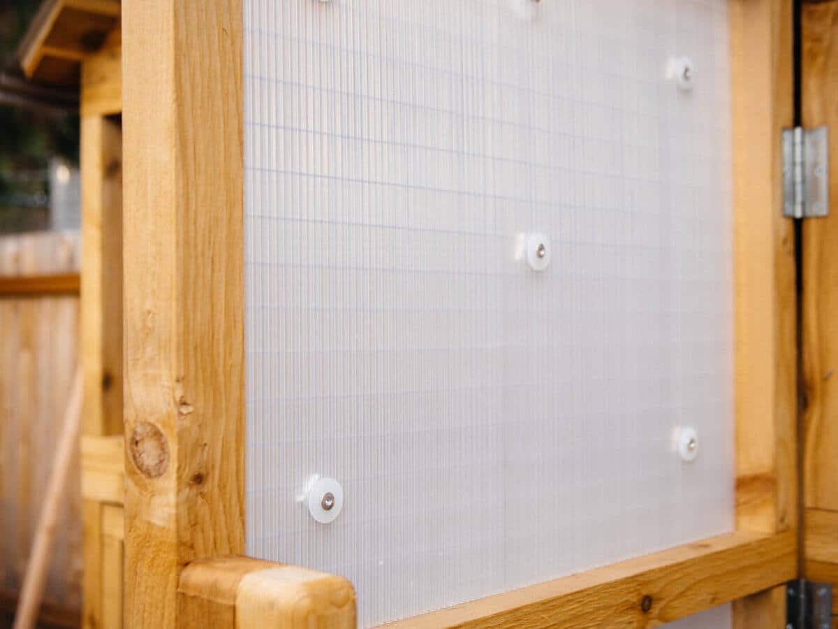 Twinwall plastic sheets provide weatherproofing on chicken coop