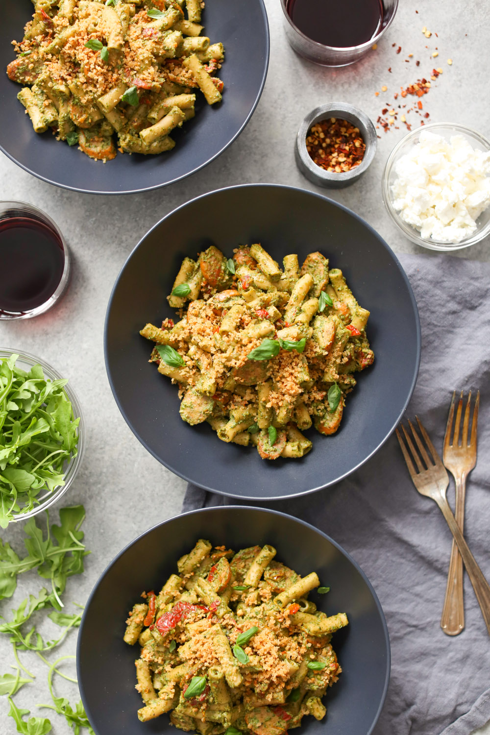 Sausage and Sun-Dried Tomato Pasta with Arugula-Goat Cheese Pesto