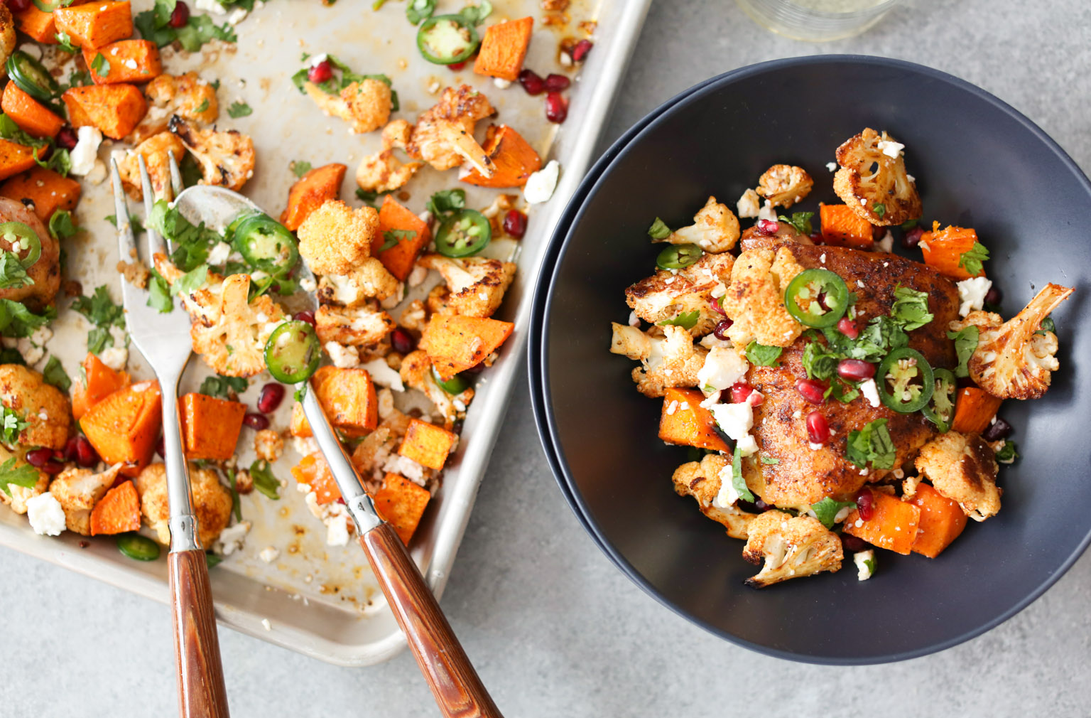 Sheet Pan Chicken Thighs with Cauliflower, Sweet Potatoes, and Pomegranate