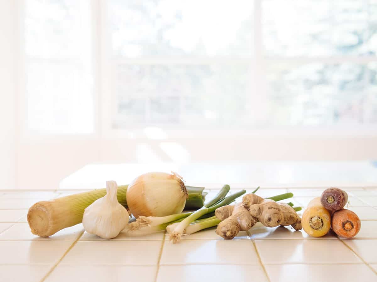 Leek, garlic, onion, scallions, ginger, and carrots