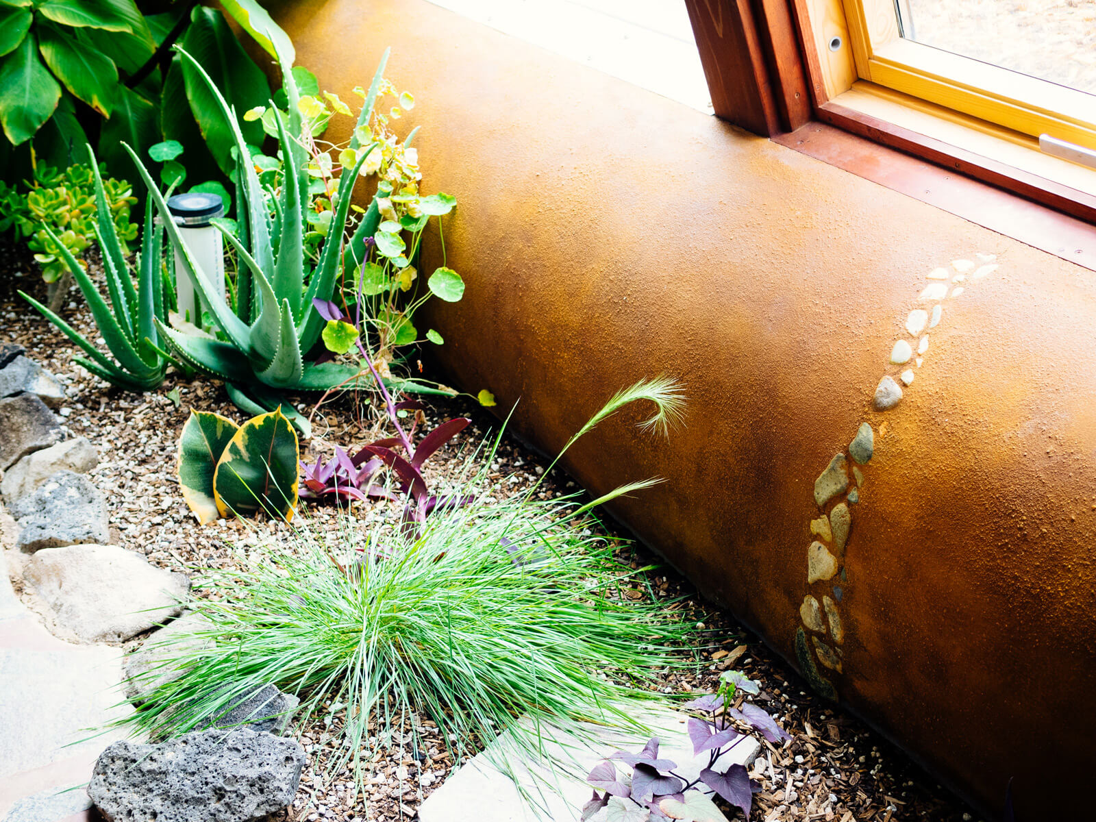 Stones laid in adobe plaster