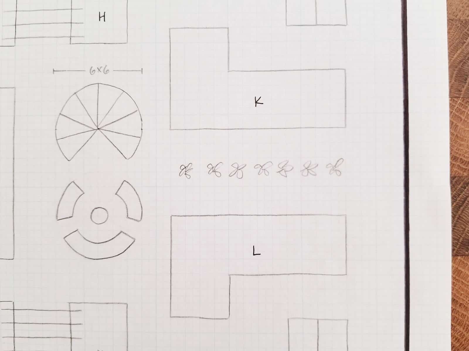 Close-up of sketch showing bean teepee and flower beds
