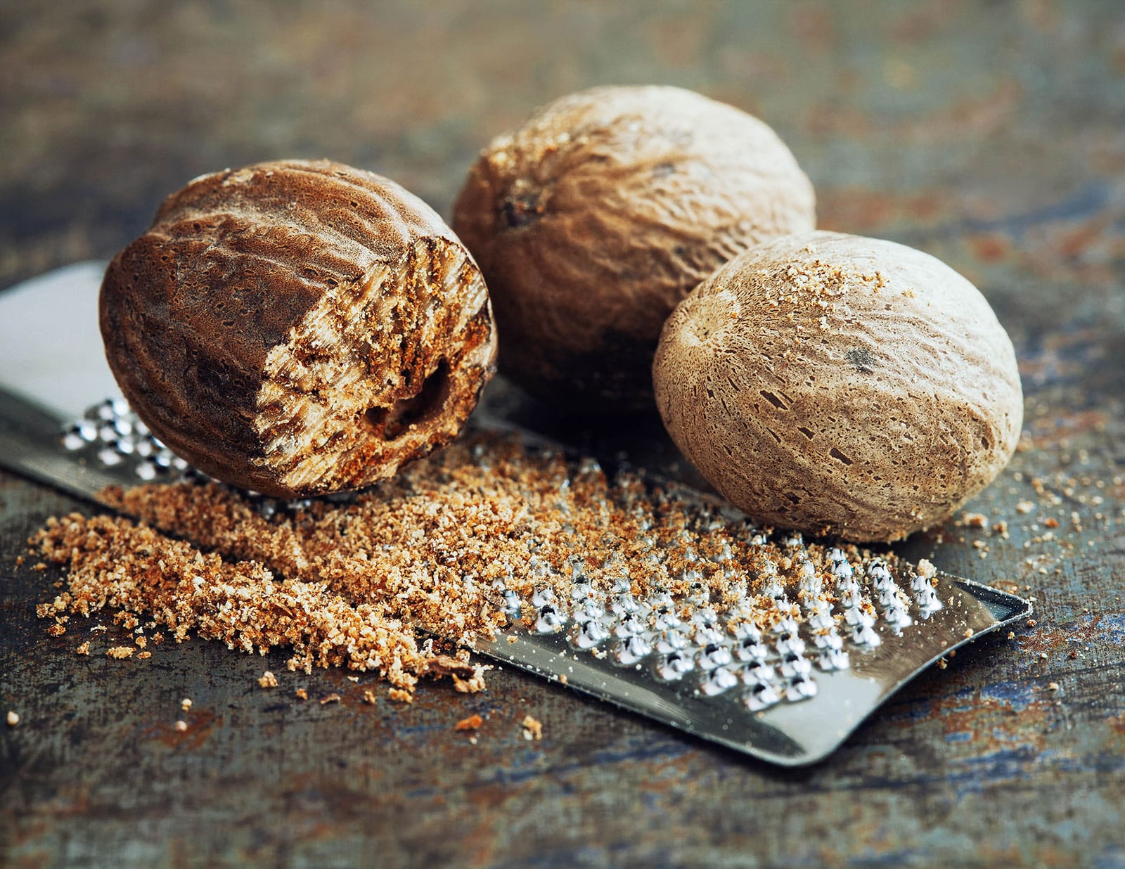 Whole and grated nutmeg